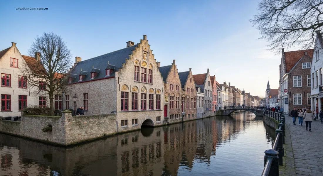 the Groeningemuseum on the Dijver in Bruges, art-deco façade reflected in the canal with winter light on the water