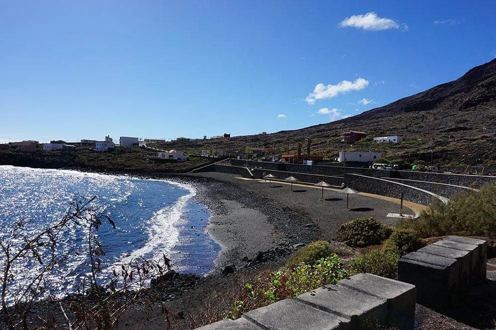 The black-sand beach and sheltered water at La Restinga, El Hierro