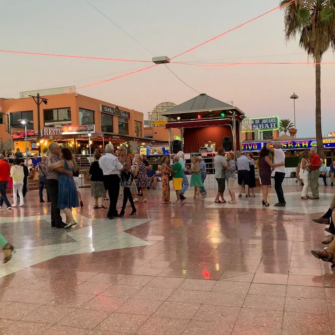 the central courtyard of the Kasbah shopping centre in Playa del Inglés during the nightly Latin dancing