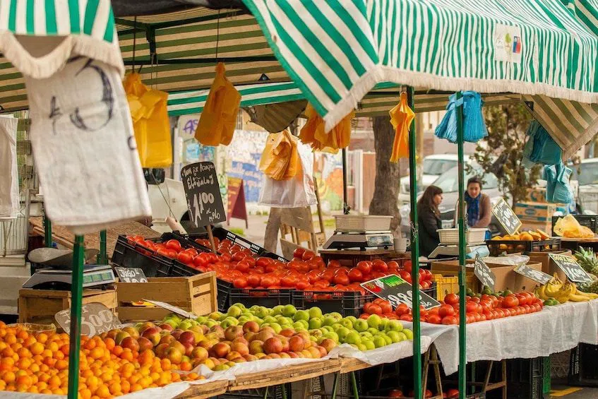 stalls at the Mogán Friday Market along the approach road into Puerto de Mogán