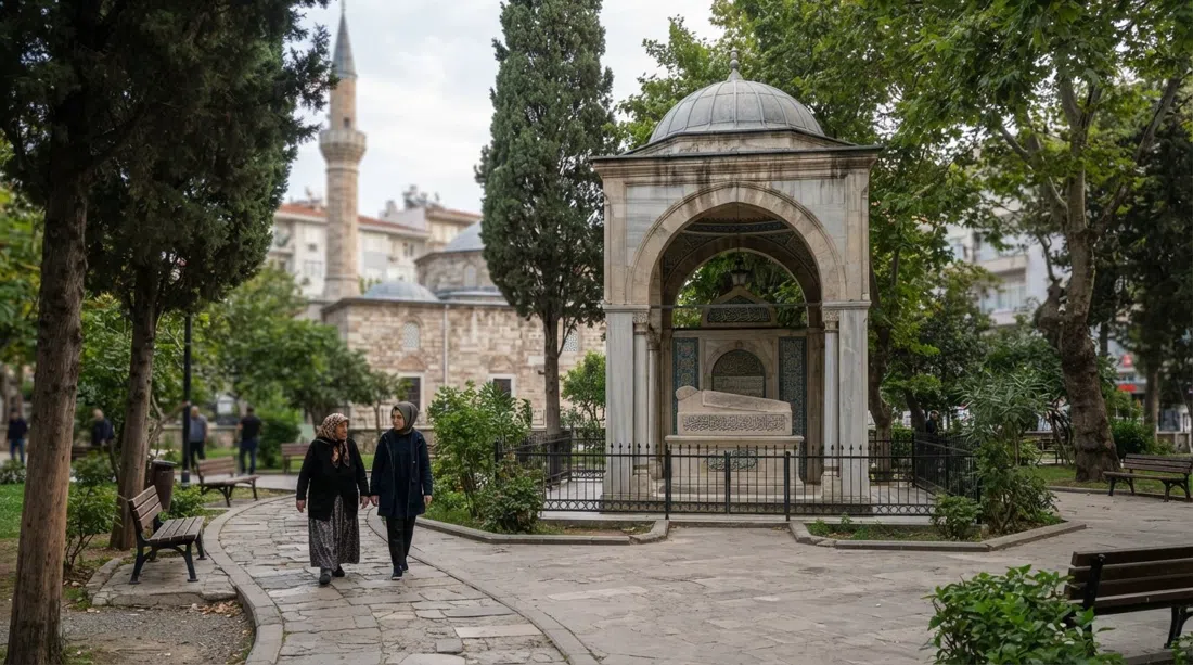 Zübeyde Hanım Anıt Mezarı in its small park near Ferik Osman Paşa Mosque, a quiet memorial scene with trees and subdued afternoon light