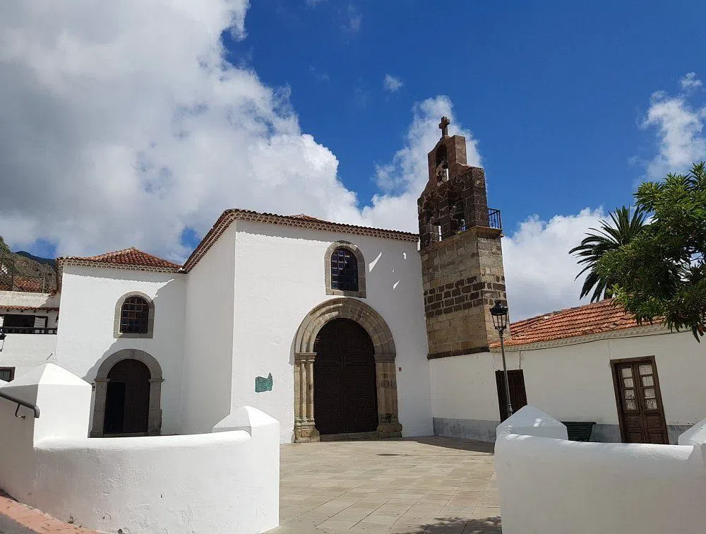 the stone bell tower of the Convento de Santo Domingo in Hermigua