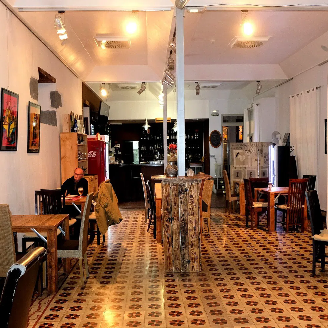 Bar Central in El Paso, terrace tables outside the colonial building near the Ermita de Nuestra Señora de Bonanza