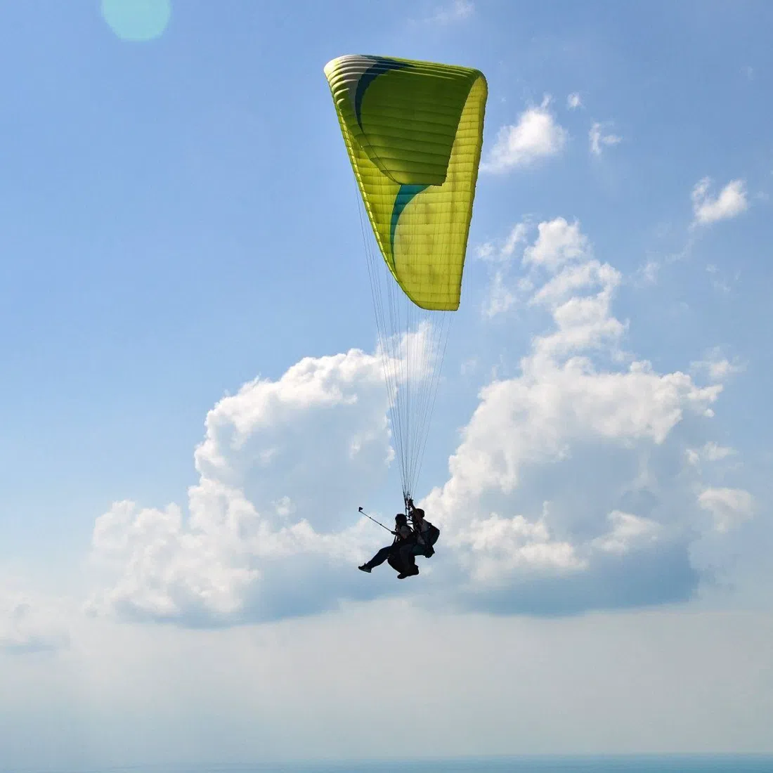 a Tandemfly paraglider landing on Puerto Naos beach