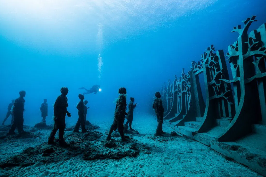 submerged human sculptures by Jason deCaires Taylor at Museo Atlántico, the underwater museum off Playa Blanca