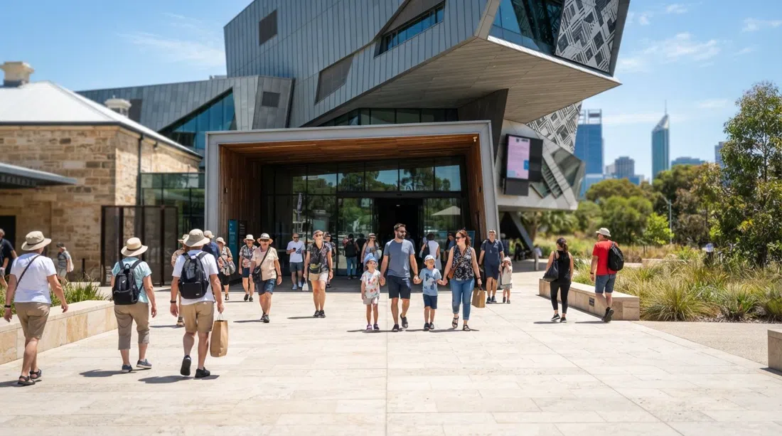 the WA Museum Boola Bardip entrance in the Perth Cultural Centre, with visitors arriving in bright midday light