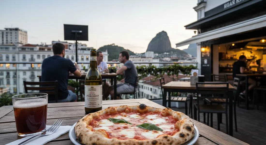 a naturally leavened Neapolitan pizza at Ferro e Farinha on Rua Arnaldo Quintela, blistered crust on a table with the rooftop bar atmosphere in soft evening light