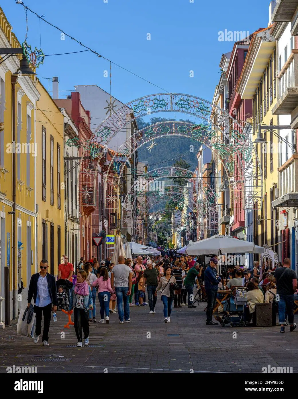 shoppers on the pedestrianised Calle Obispo Pérez Cáceres behind the plaza in Candelaria