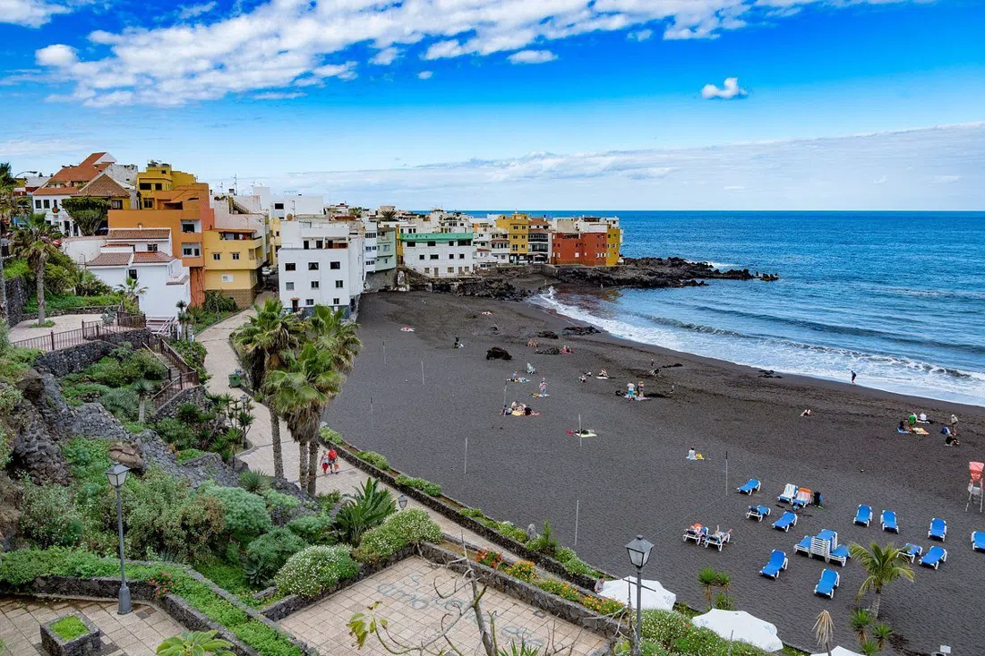 Playa Jardín black-sand beach with palm gardens in Puerto de la Cruz