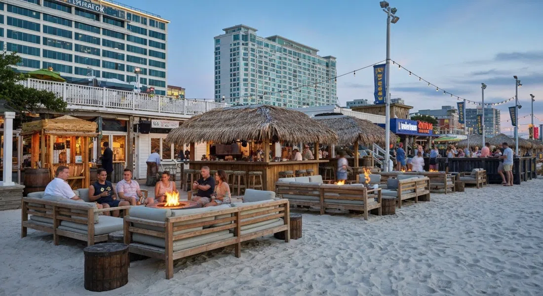LandShark Bar & Grill at Resorts with a beach stage, tiki bar and firepit lounges set up for a summer night on the sand