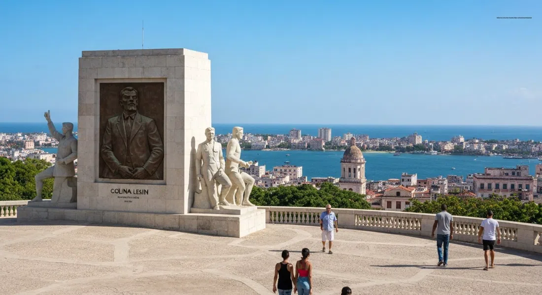 Colina Lenin on its hill with the bronze Lenin relief, pale sculpted figures around it, and the bay view back toward Old Havana in clear afternoon light