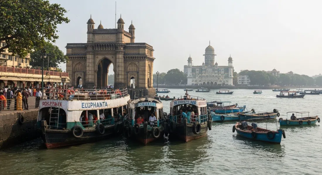 public ferries waiting beside the Gateway of India jetty for Elephanta, small boats on the harbour and the Taj Mahal Palace in the background