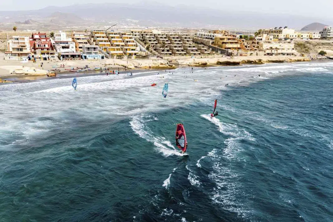 El Cabezo, the wave-driven wind-sports spot at the far end of El Médano